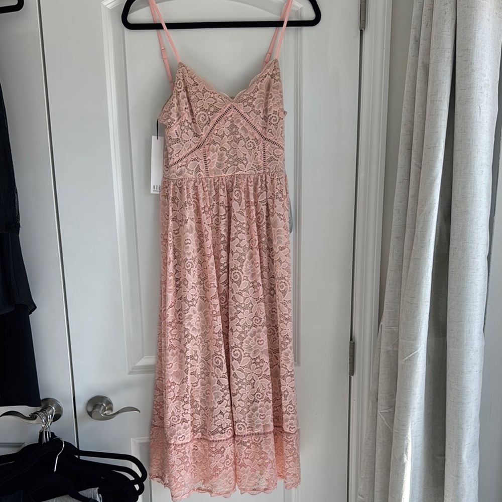NSR laced lined dress with adjustable straps and zipper on side